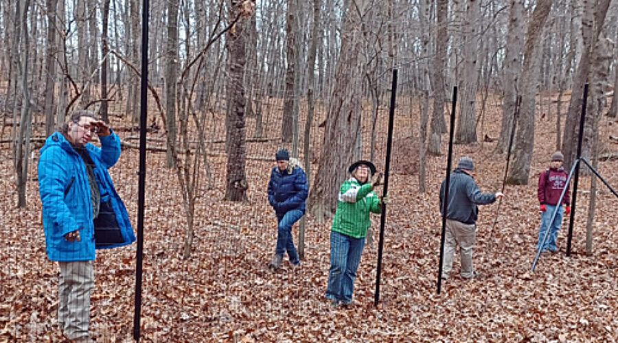 Volunteers installing fencing