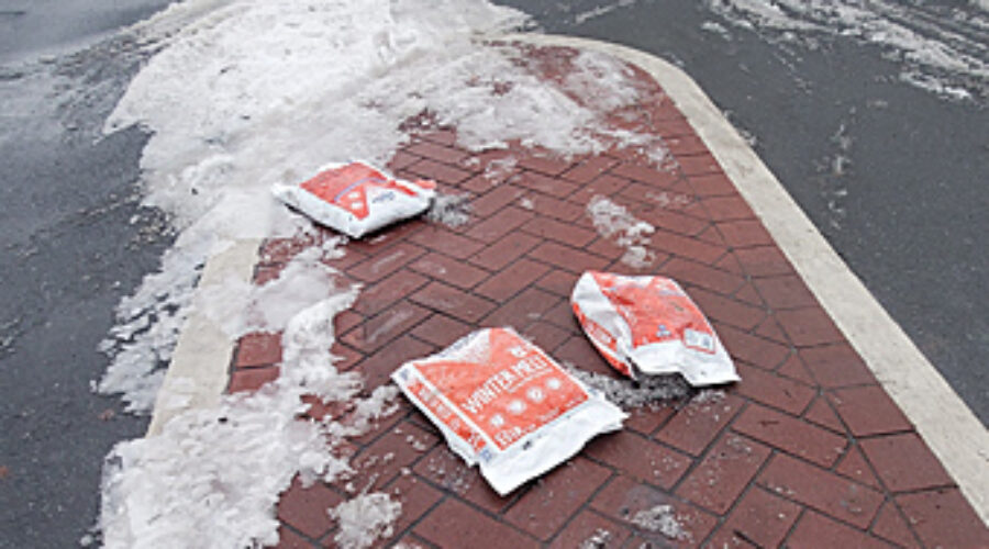 Bags of salt on pavement