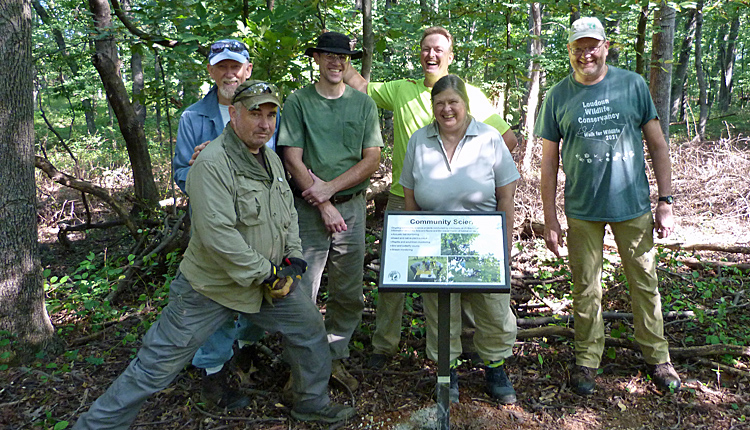 Sign installation crew at JK Black Oak